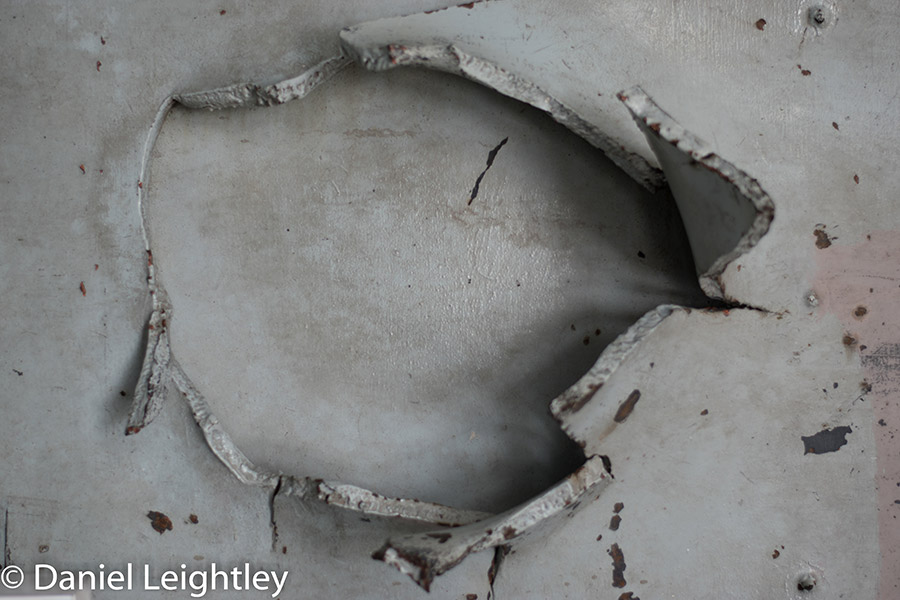 Shell damage to WW2 ship, repaired